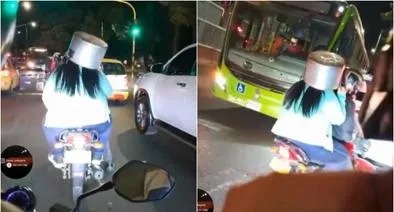 El que se vara es porque quiere: mujer cogió una olla como casco